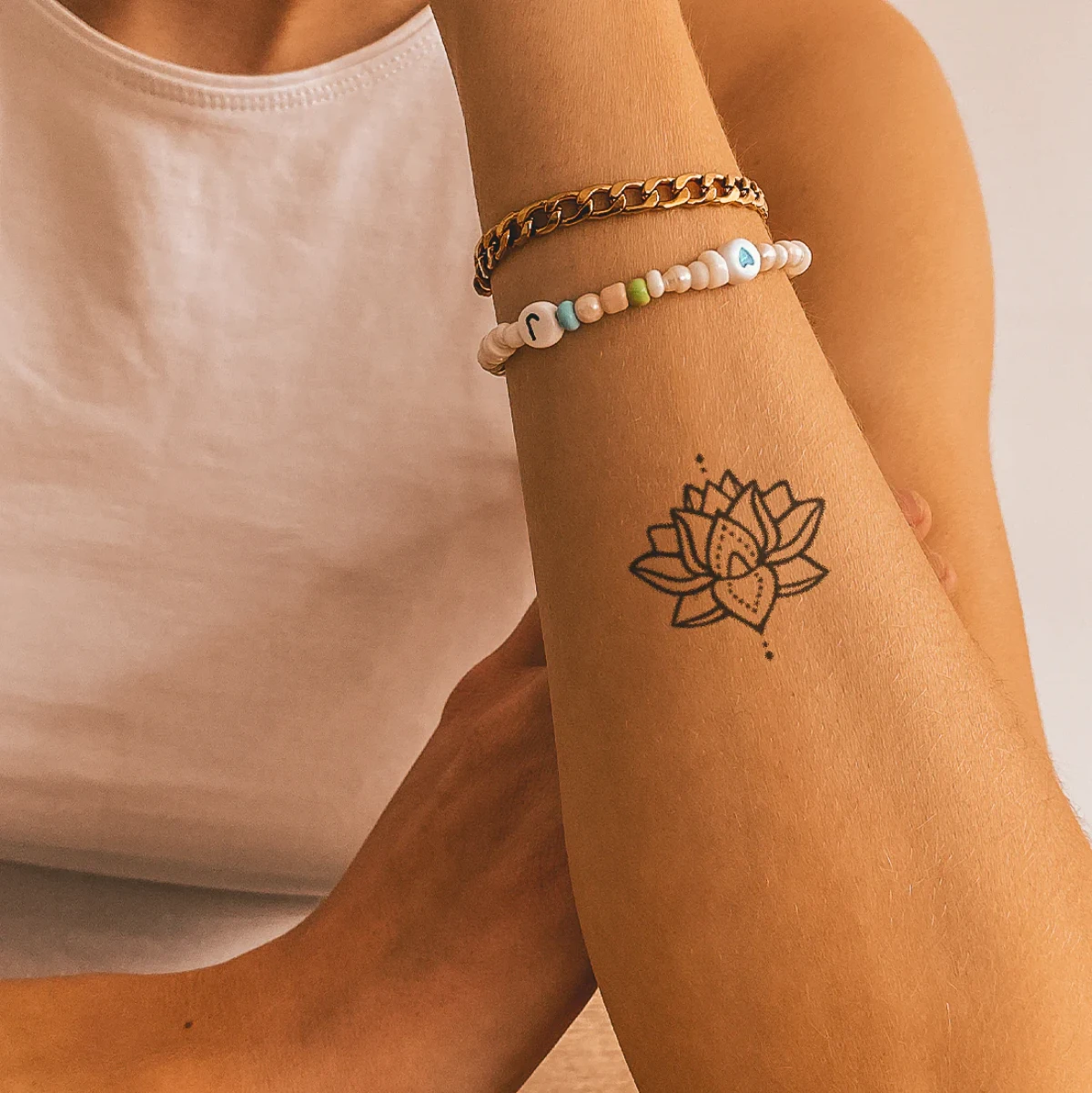 1702918897 506 The best ideas for a unique and elegant small tattoo.webp - The best ideas for a unique and elegant small tattoo for women!  Trends in 2024