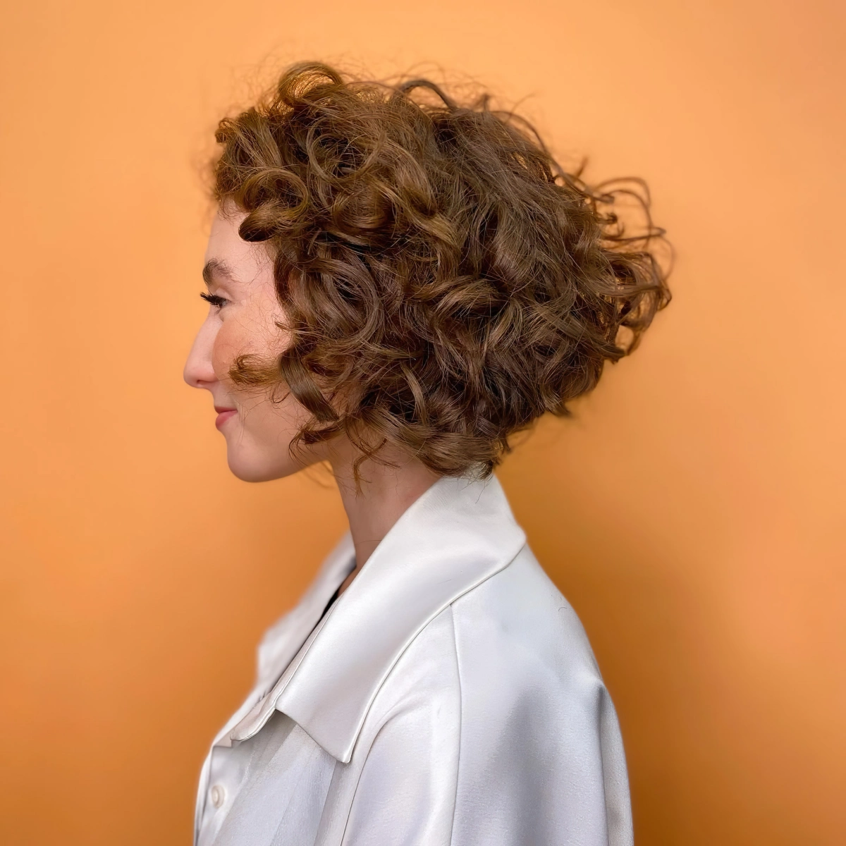 1707831044 254 the natural curly plunging bob.webp - the natural curly plunging bob!